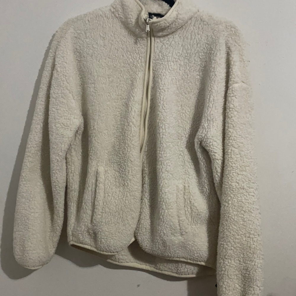Zip up sweater.